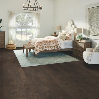 patterned area rug in a bedroom